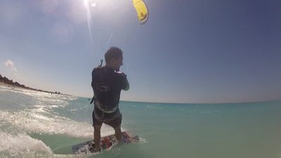 a man on a surfboard in the ocean